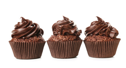 Tasty chocolate cupcakes on white background