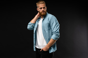 Portrait of happy fashionable handsome man in jeans shirt look at camera.