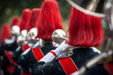 Details from a show and Marchingband or fanfare and drumband with uniforms and Instruments.