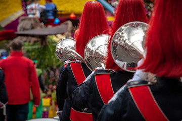 Details from a show and Marchingband or fanfare and drumband with uniforms and Instruments.