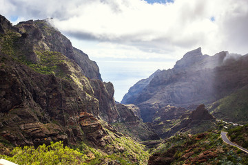 Mountain serpentine. Landscape of the Masca Gorge. Beautiful views of the coast with small villages in Tenerife, Canary Islands