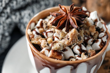 Cup of hot chocolate with marshmallows and cookies, closeup