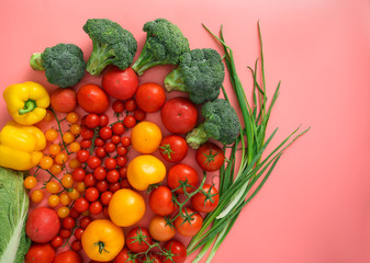 Composition with different vegetables on color background