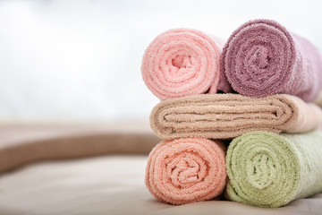 Fototapeta na wymiar Clean soft towels on bed