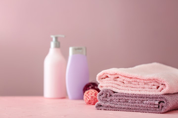 Stack of clean soft towels on table