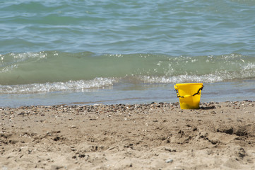 bucket and spade on the beach