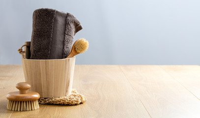 genuine cleansing, dry brushing, body care concept, wooden copy space