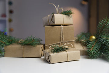 Fototapeta na wymiar Prepared Christmas presents. Holiday and christmas concept. Wrapped christmas gifts.