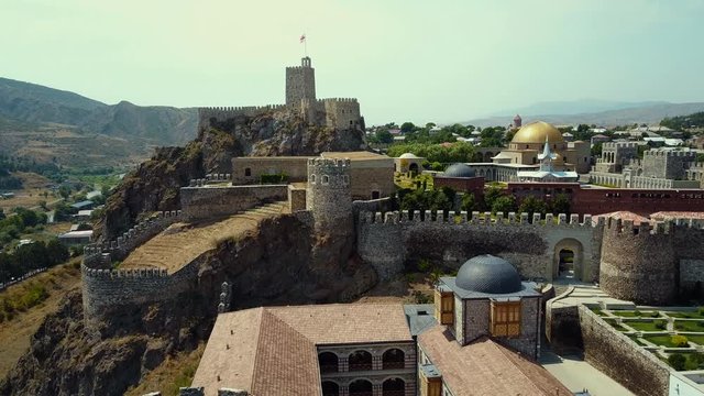 Drone footage of external decoration of Akhaltsikhe fortress Rabati, ancient castle has been completely restored, located on a high hill in the city center, Georgia