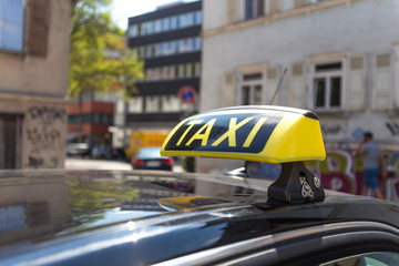 german taxi sign in an urban enviroment