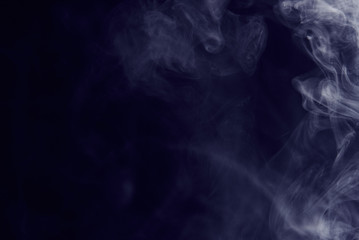 Fototapeta premium grey smoke on a dark background