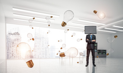 Businessman with TV instead of head.