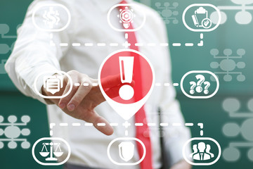 Businessman clicks a exclamation mark with location map marker on a virtual structural panel....