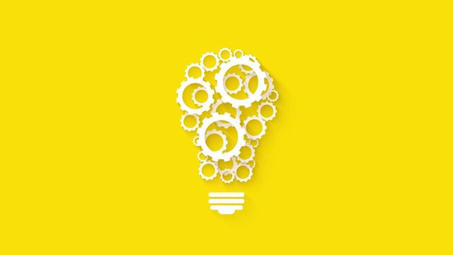gears light bulb yellow background