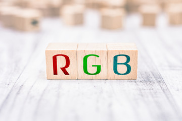 The Abbreviation RGB Formed By Wooden Blocks On A White Table
