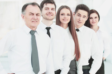 group of young business people standing in a row.