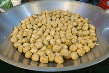 Fried fishball in hot pan., Frie fishballs is street food in Thailand