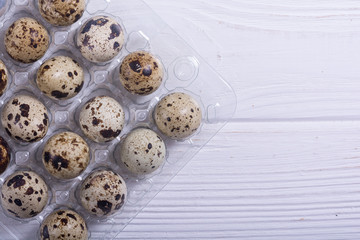 Raw qail eggs background
