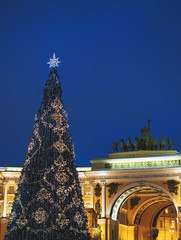 Christmas tree on the Palace Square in St. Petersburg at night.