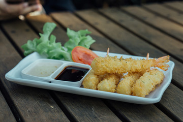 Fried shrimps with tomato sauce., Fried mozarella cheese sticks