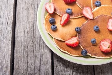 Pancakes with strawberry and blueberry