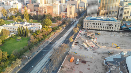 ADELAIDE, AUSTRALIA - SEPTEMBER 16, 2018: Aerial view of city skyline at sunset. Adelaide is the main city of South Australia State