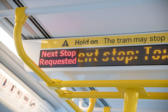 Next Stop Sign Inside Tram Train