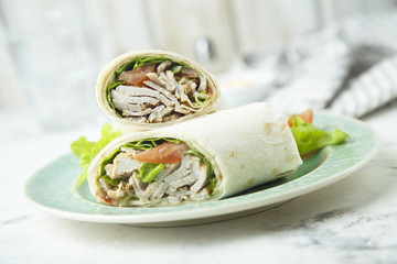 Homemade chicken wraps with vegetables