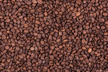 Roasted arabica coffee beans background or texture