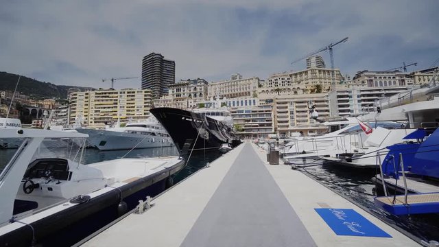 Yachts in sunny Monaco city Monte Carlo town Monte Carlo street