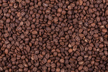 Roasted arabica coffee beans background or texture