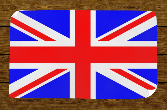 Illustration of a British flag on the papier pasted on the woody wall