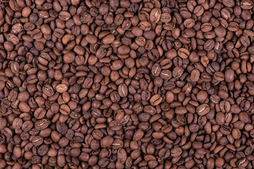 Roasted arabica coffee beans background or texture