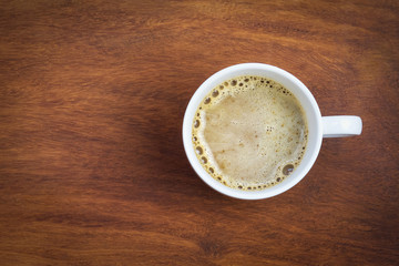 top view coffee cup on wood background
