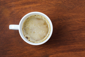 top view coffee cup on wood background