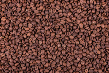 Roasted arabica coffee beans background or texture