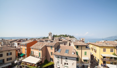 Fototapeta premium Sirmione - Italy APRIL 2018 - small village from Scaliger Castle Castle. Garda Lake - Travel destination.