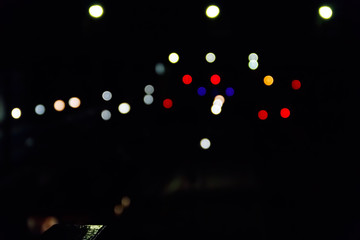 Abstract background of blurred city lights with bokeh effect