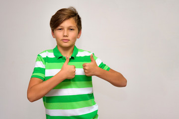 Studio portrait of a teenage boy on a white background with different emotions.