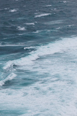 aerial view of ocean with foamy waves for background