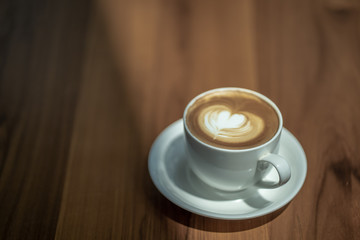 coffee latte art espresso in coffee shop vintage color tone