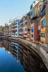 Fototapeta na wymiar Colorful houses at river Onyar in Girona, Catalonia Spain