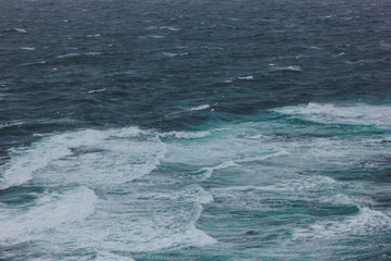 dramatic shot of wavy blue ocean for background