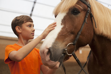 Horse and teen boy - best friends