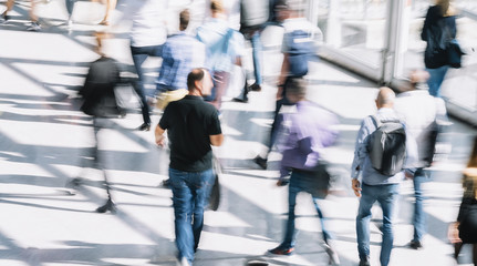 Crowd of people walking on a street in london