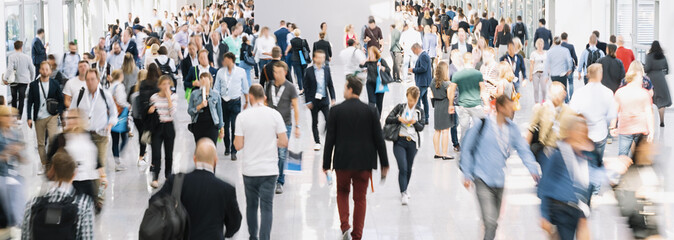 large crowd of anonymous blurred people