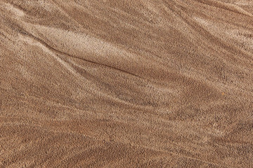 Background of wet river sand.