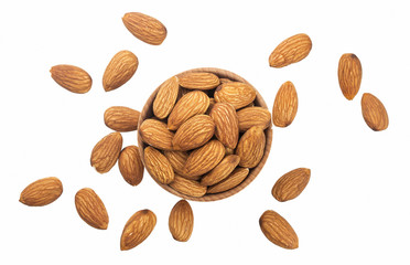 Almond nut in a wooden bowl isolated on a white background. Top view