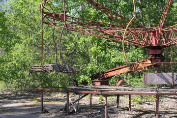 Abandoned carousel in the amusement park near the ghost town of Pripyat, Chernobyl exclusion zone, Ukraine