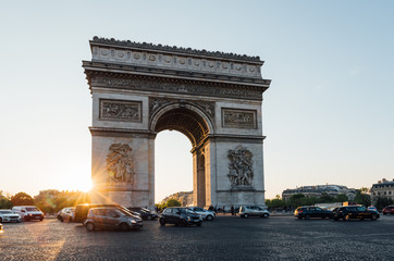 Fototapeta na wymiar Paris Arc de Triomphe (Triumphal Arch) in Chaps Elysees at sunset, Paris, France.